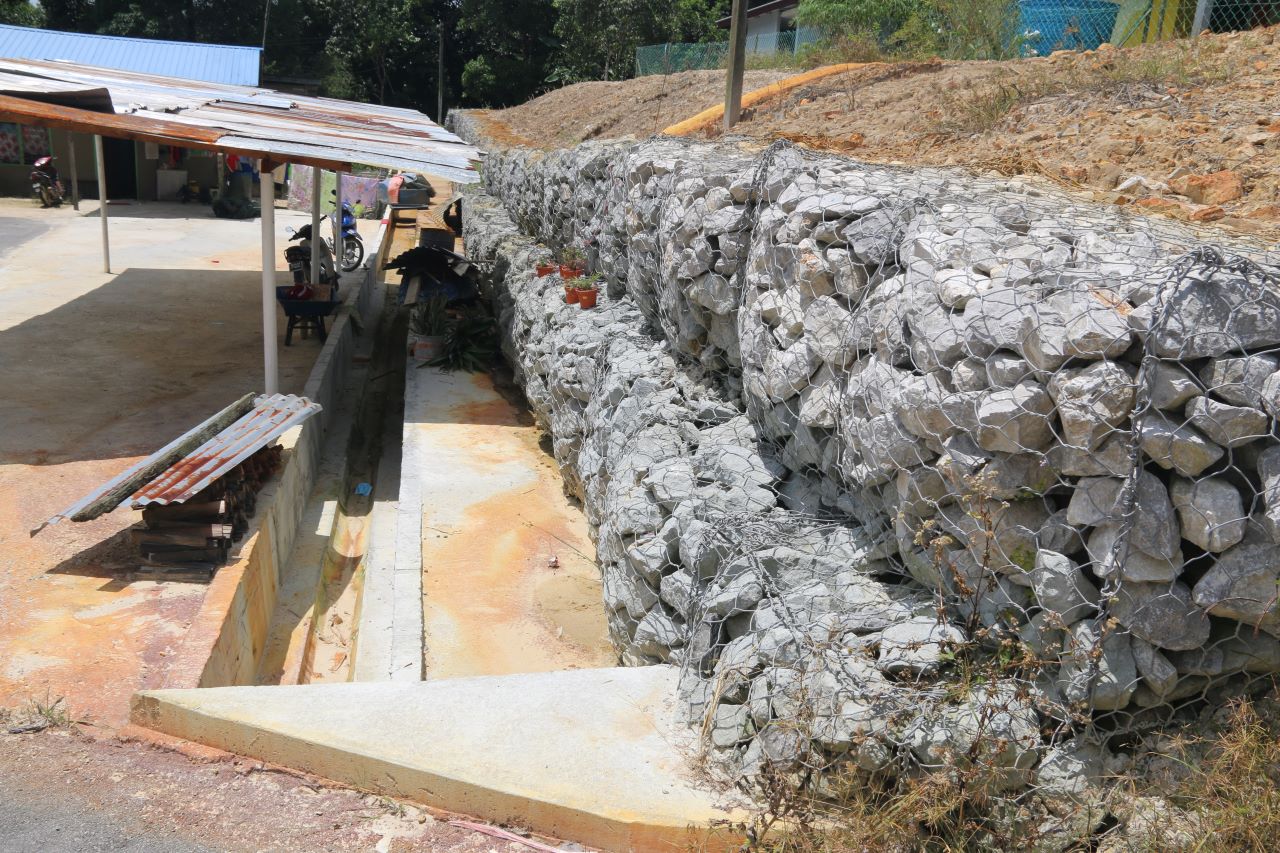 Newly constructed gabion wall and drainage